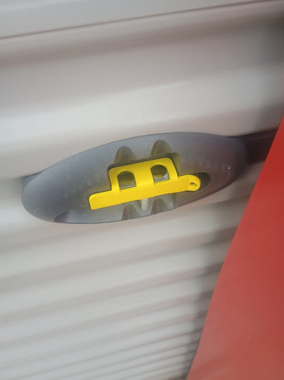 Bubble Latch Lock Shield in Poweder Coat Yellow installed on storage unit